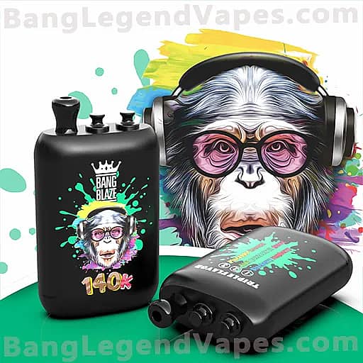 A black vape mod features a bright, graphic illustration of a chimpanzee wearing pink-rimmed glasses and headphones, with a crown above and 'Bang Blaze' branding, alongside a second curved vape device, all set against a white background with colorful paint splashes.