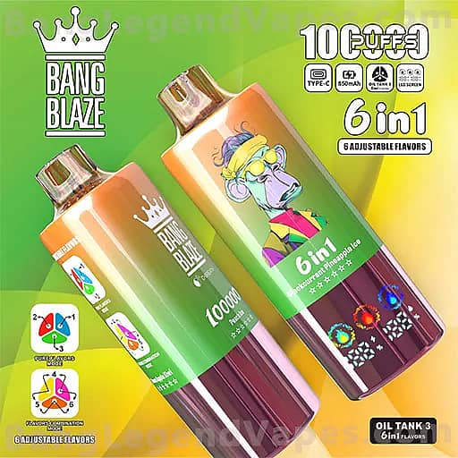 Two Bang Blaze vape bottles with colorful labels on a bright green-to-yellow gradient background, the left orange bottle with a crown logo and the right green bottle featuring a cartoon monkey wearing sunglasses and a colorful outfit, both advertising 6 in 1 flavors.