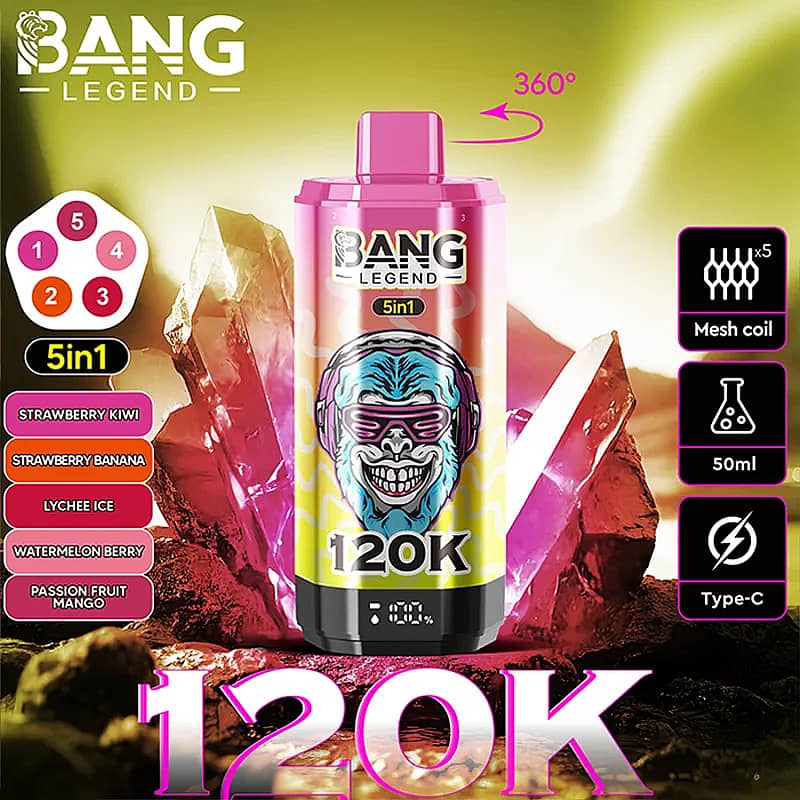 A bright pink and yellow Bang Legend 120K vape juice can with a blue skull logo and '5in1' label sits against a rocky pink crystal background; on the left is a circular 5in1 flavor wheel and a list of flavors—Strawberry Kiwi, Strawberry Banana, Lychee Ice, Watermelon Berry, and Passion Fruit Mango; on the right are icons for Mesh coil, 50 ml, and Type-C, with a '360°' rotation marker above the can.