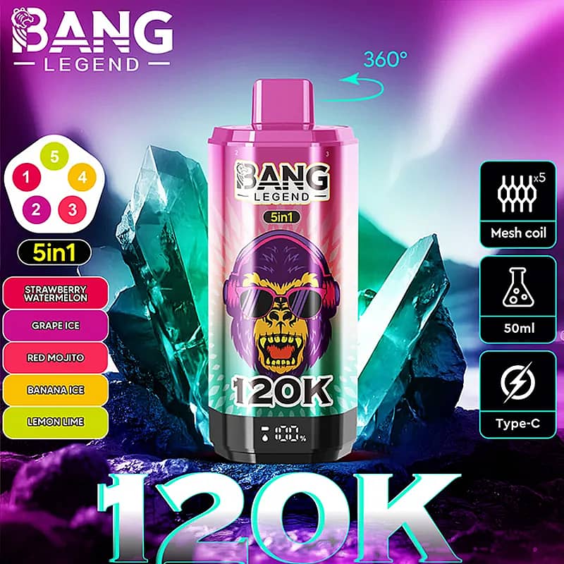 A Bang Legend 5in1 energy drink can with a pink‑teal gradient and a skull wearing sunglasses, labeled 120K, set among icy crystals; a flavor list on the left shows Strawberry Watermelon, Grape Ice, Red Mojito, Banana Ice, and Lemon Lime, with icons for mesh coil, 50ml, and Type‑C on the right.